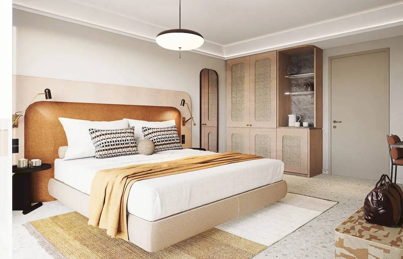 Innenansicht eines Schlafzimmers im Cactus Village Hotel mit einem großen Bett, Dekor und Möbeln.