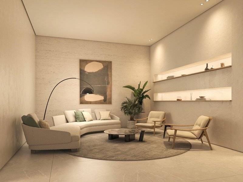 Wohnbereich des Jaz Elite Amara Hotels mit moderner Einrichtung und zentralem Couch.