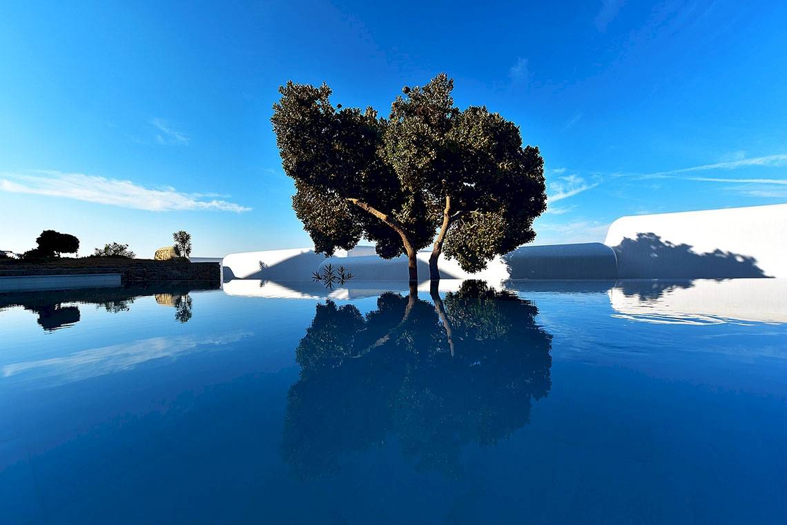 Außenpool des Mykonos Grand Hotel mit reflektiertem Baum
