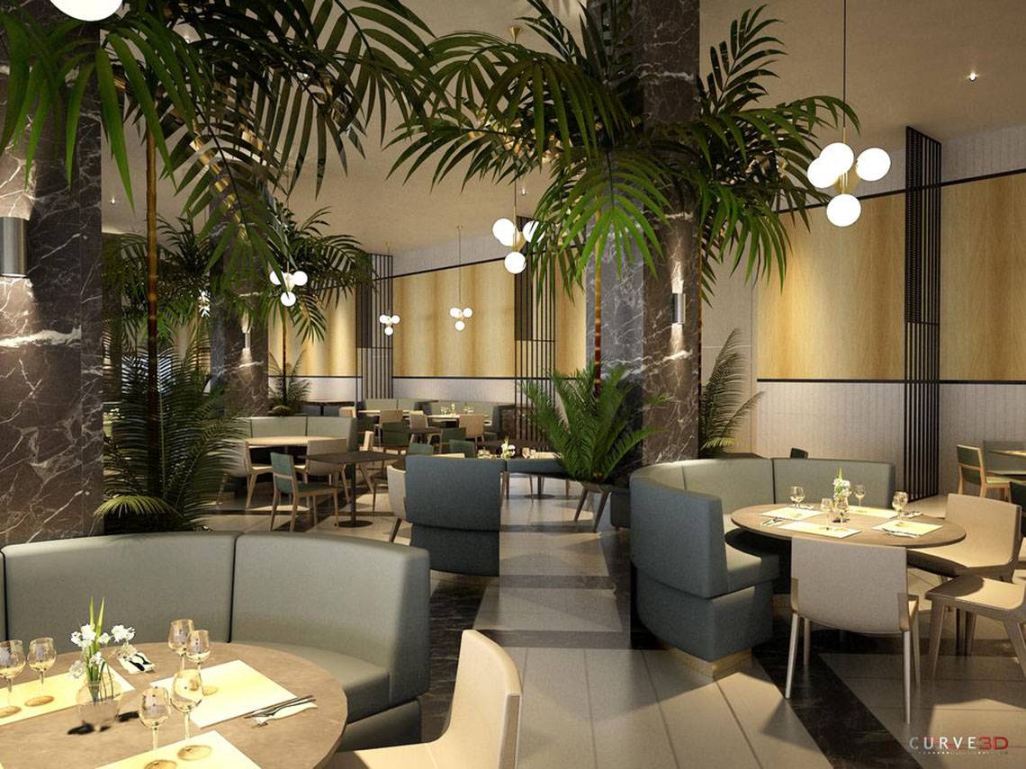 Innenbereich des NissiBlu Beach Resort Restaurants mit modernen Möbeln und Pflanzen.