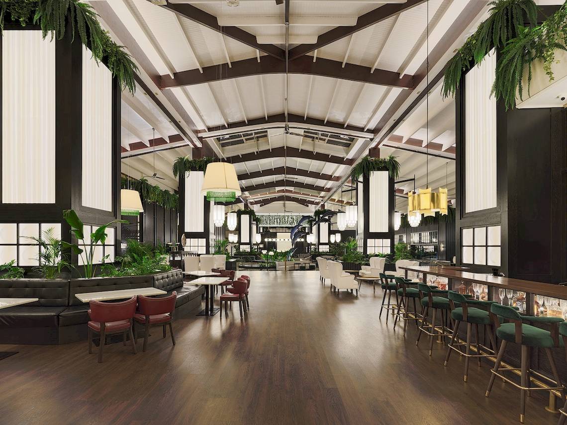 Innenbereich des H10 Rubicon Palace Hotels mit Holzboden, weißen Stühlen, Tischen und grünen Barhockern.