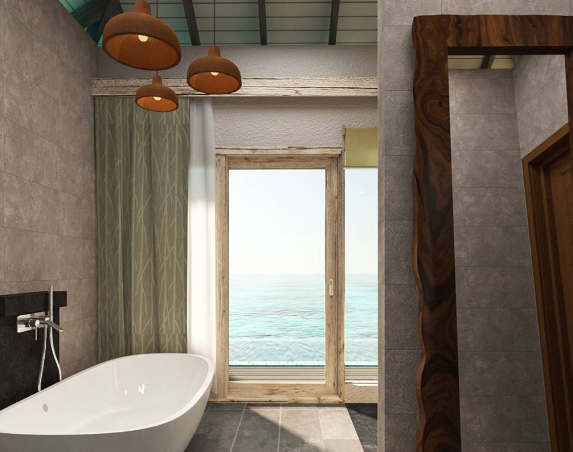Badezimmer mit Meerblick im You & Me Maldives Hotel mit Badewanne und Glastür.