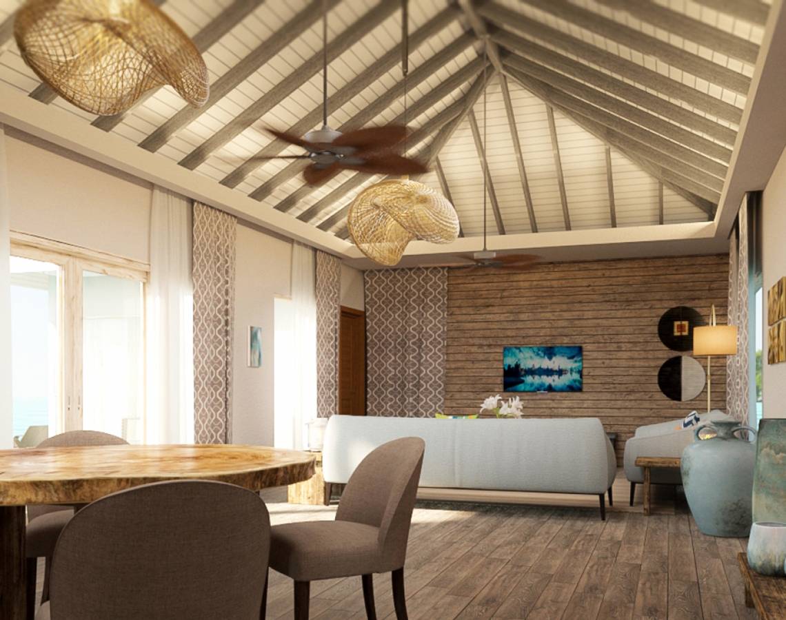 Innenansicht des Esszimmers im Hotel You & Me Maldives mit Holzboden und weißen Möbeln.