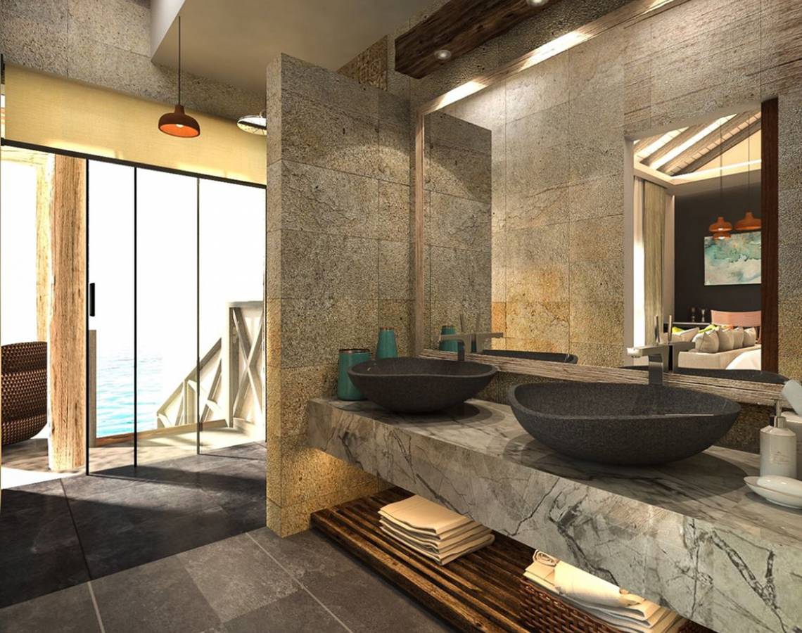 Badezimmer mit Doppelwaschbecken und Meerblick im Hotel You & Me Maldives.