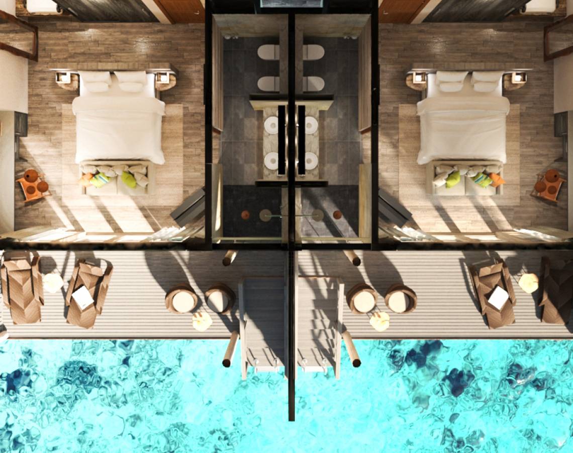 Luftaufnahme des You & Me Maldives Hotels mit Wasserbetten und Aussicht auf das Meer.