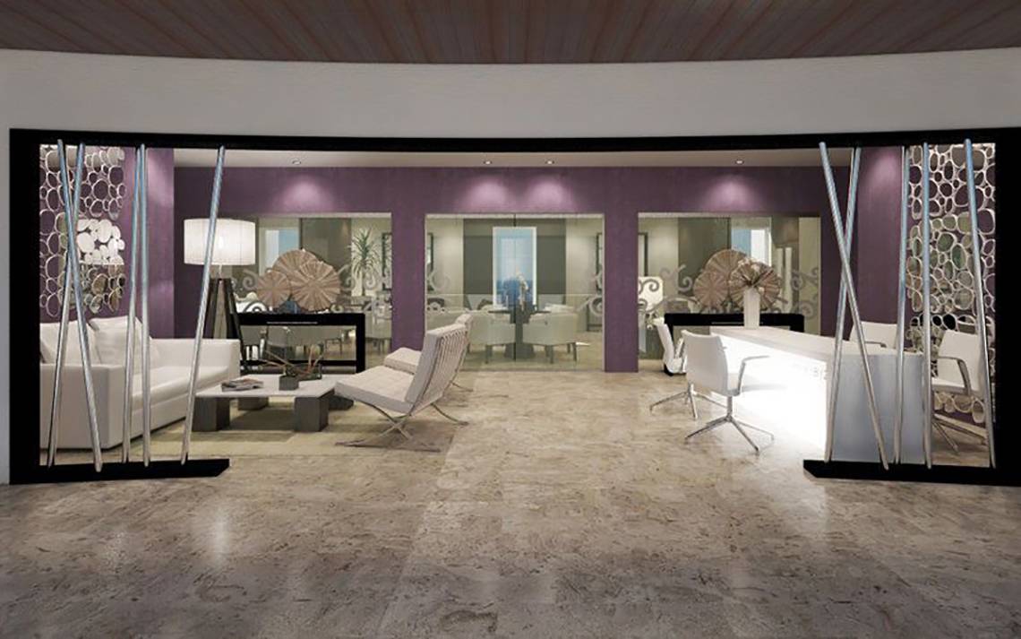 Loungebereich des Melia Varadero Hotels mit weißen Möbeln und violetten Wänden.