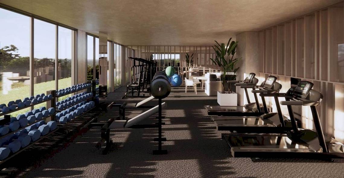 Fitness-Center im Liu Resorts mit Laufbändern, Hanteln und anderen Trainingsgeräten.