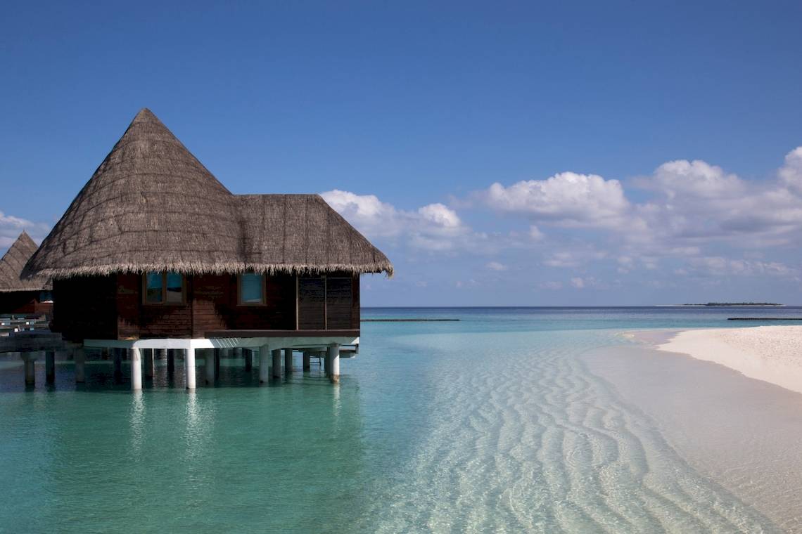 Coco Palm Dhuni Kolhu Resort Wasserbungalow am Strand