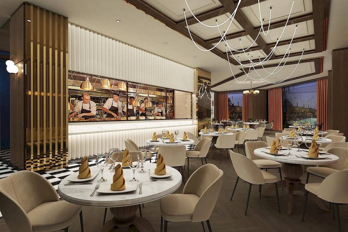 Restaurant im Lago Hotel mit moderner Einrichtung, Blick auf Köche und Panoramafenster.