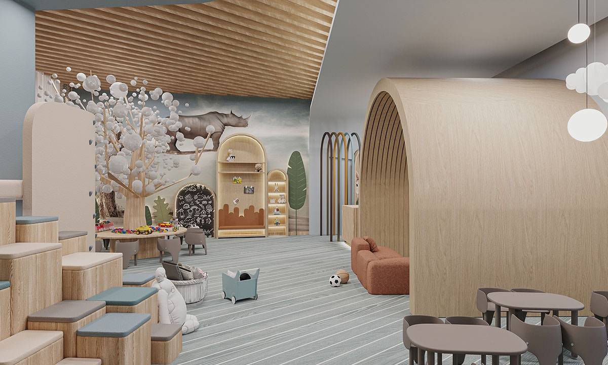 Kinderzimmer im Gloria Serenity Resort mit weichen Möbeln und einer Wandmalerei.