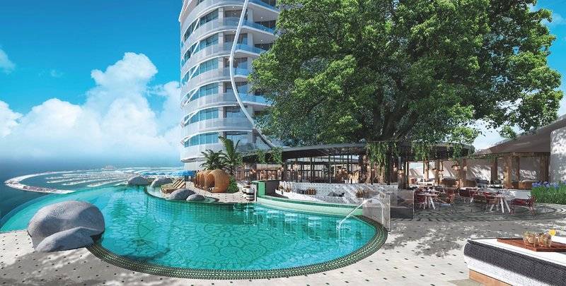 Außenpoolbereich des W Dubai - Mina Seyahi Hotels mit moderner Architektur und Meerblick
