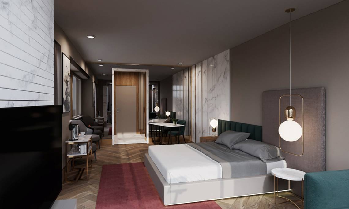 Innenansicht des Schlafzimmers im Sherwood Exclusive Lara Hotel mit einem großen Bett, Nachttischen und elegante Beleuchtung.