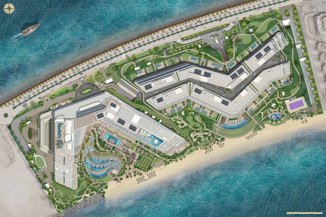 Luftaufnahme des W Dubai - The Palm Hotels, inklusive Pools und Strandbereich.