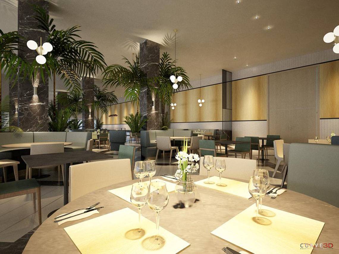 Innenansicht des Restaurants im NissiBlu Beach Resort mit Tischen, Stühlen und Pflanzen.