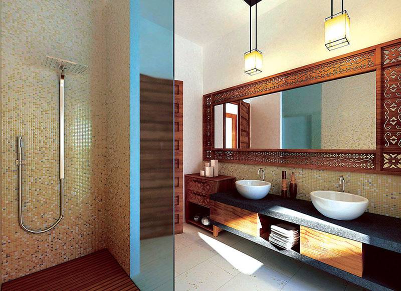 Badezimmer im Bahari Zanzibar Hotel mit Regendusche und doppeltem Waschbecken.