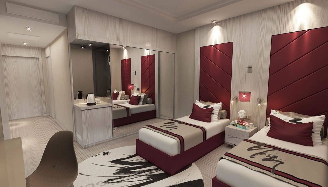 Moderne Hotelzimmer im Delphin BE Grand Resort mit zwei Einzelbetten und eleganter Einrichtung in neutralen Farben.