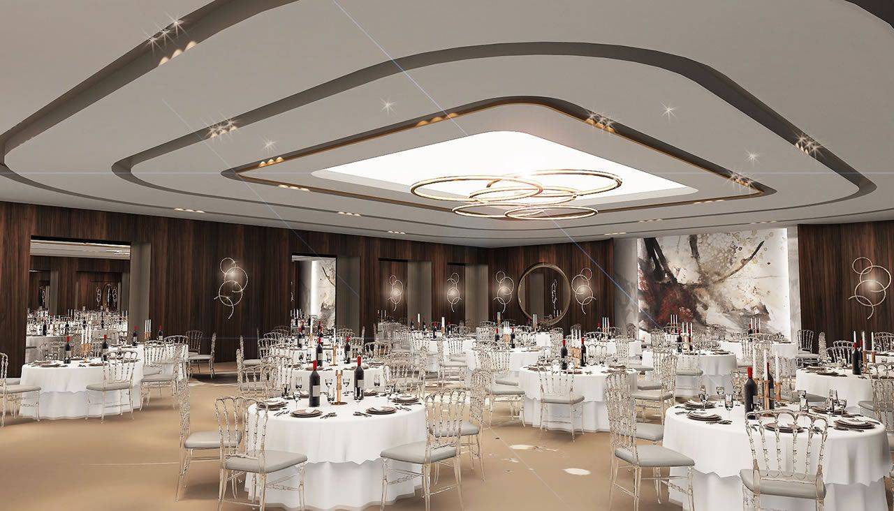 Elegantes Restaurant im Delphin BE Grand Resort mit festlich gedeckten Tischen und modernem Dekor.