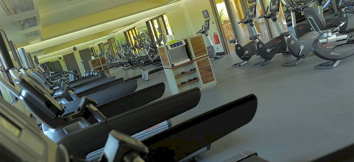 Fitnessstudio mit Laufbändern im Trou aux Biches Beachcomber Golf Resort & Spa