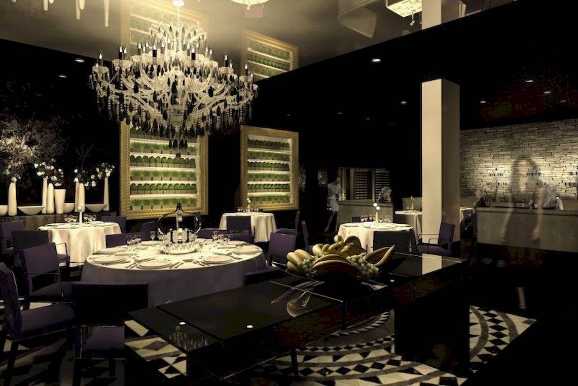Restaurant im Sofitel Agadir Thalassa Sea & Spa Hotel mit Tisch, Früchten und Kronleuchter.