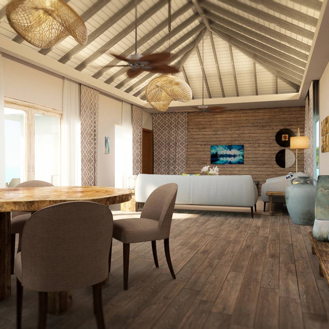 Innenansicht des Esszimmers im Hotel You & Me Maldives mit Holzboden und weißen Möbeln.