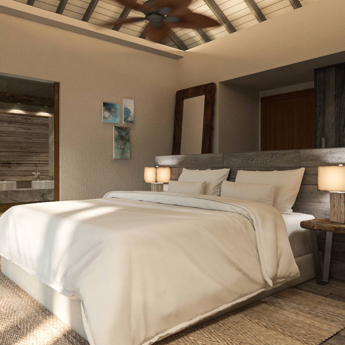 Schlafzimmer im You & Me Maldives Hotel mit weißem Bett und Nachttischen.