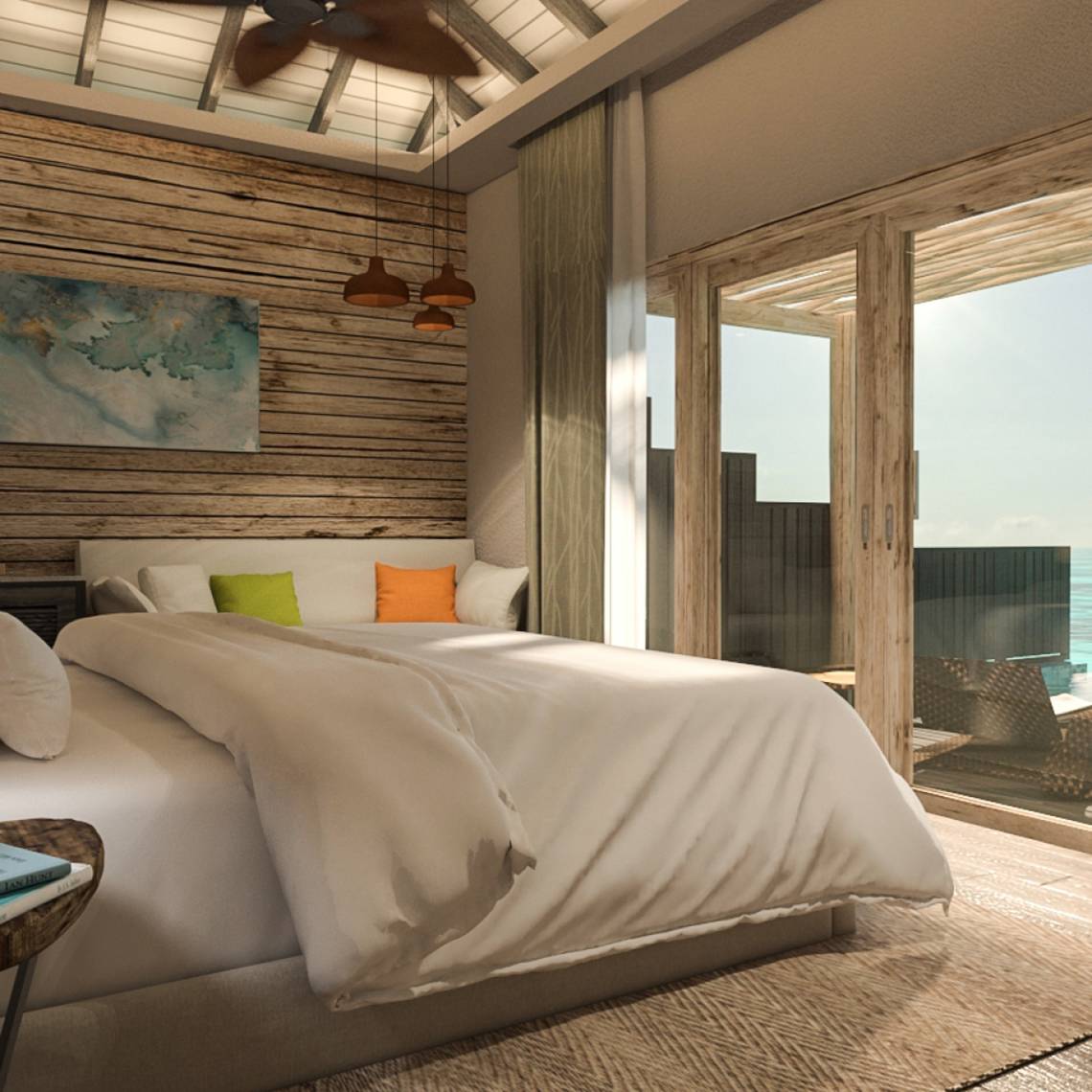 Schlafzimmer mit Bett und Meerblick im You & Me Maldives Hotel