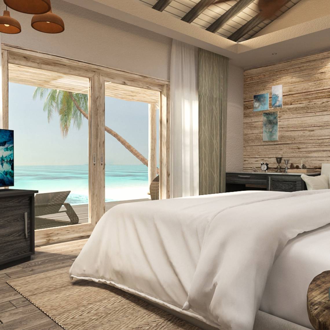 Schlafzimmer mit Meerblick im You & Me Maldives Hotel, zeigt ein großes Bett mit weißen Laken.