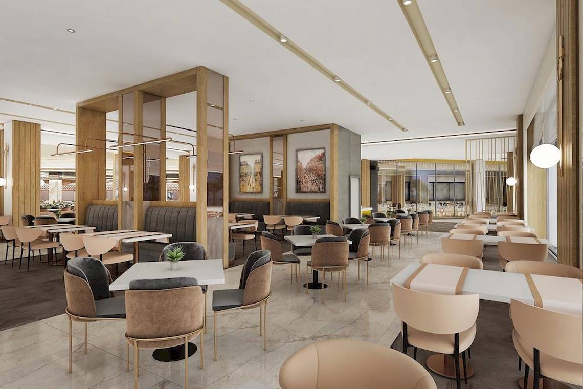 Innenansicht des Restaurants im Lago Hotel mit runden Tischen und Stühlen.