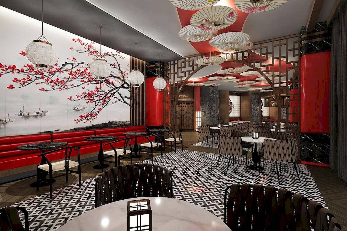 Innenbereich des Lago Hotels, Restaurant mit roten Wänden, schwarzen und weißen Tischdecken, und traditionellen chinesischen Lampions.