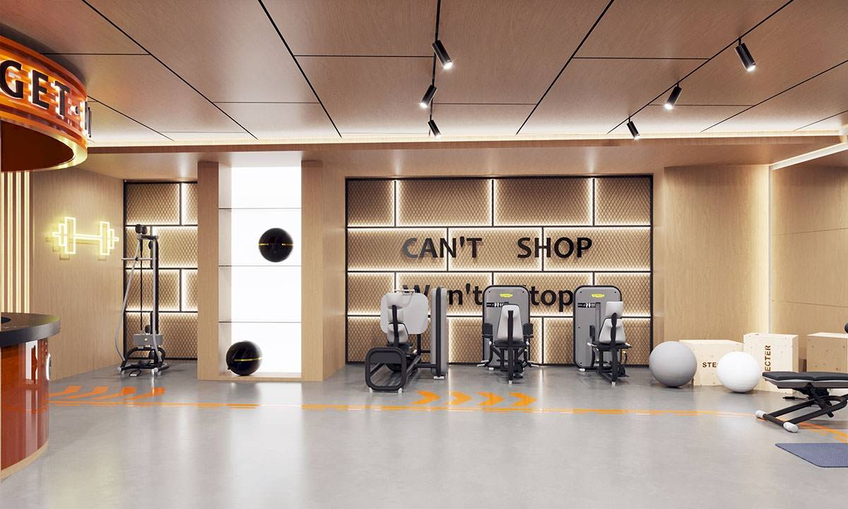 Innenansicht des Fitnessstudios im Gloria Serenity Resort mit moderner Ausstattung und einer 'Can't Shop' Wand.