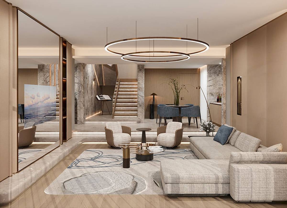 Das elegante Wohnzimmer des Gloria Serenity Resort mit einer großen Couch, Stühlen und einem großen Teppich.