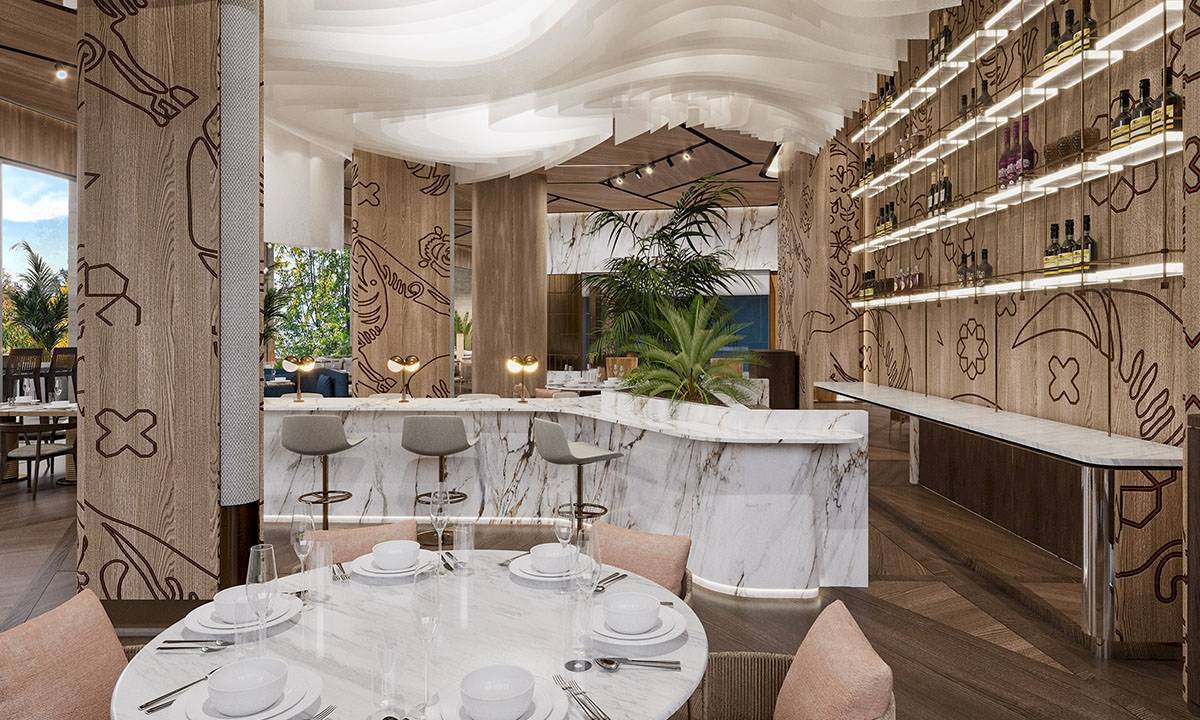 Innenraum des Gloria Serenity Resorts mit Esstisch, Bar und modernen Möbeln.