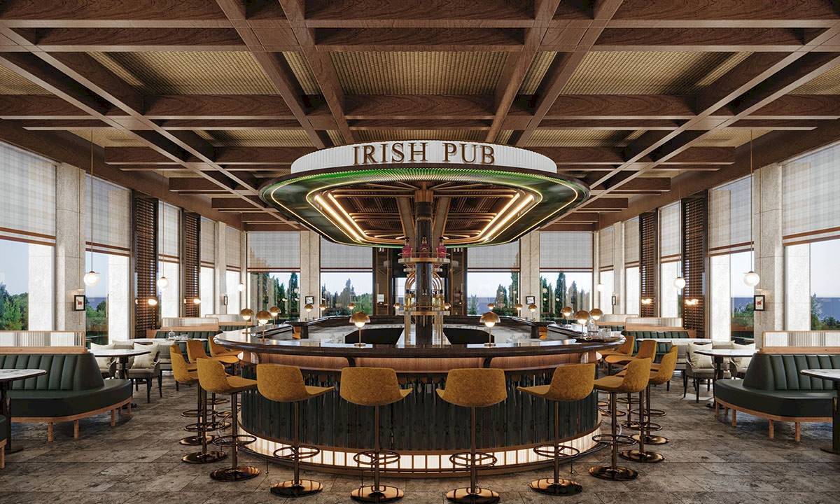 Innenansicht des Irish Pub im Gloria Serenity Resort mit Bar, Sitzgelegenheiten und großen Fenstern.