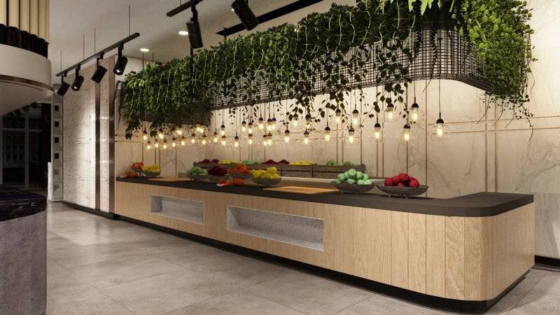 Restaurant-Buffet-Tisch im Ethno Belek mit Früchten und Pflanzen.