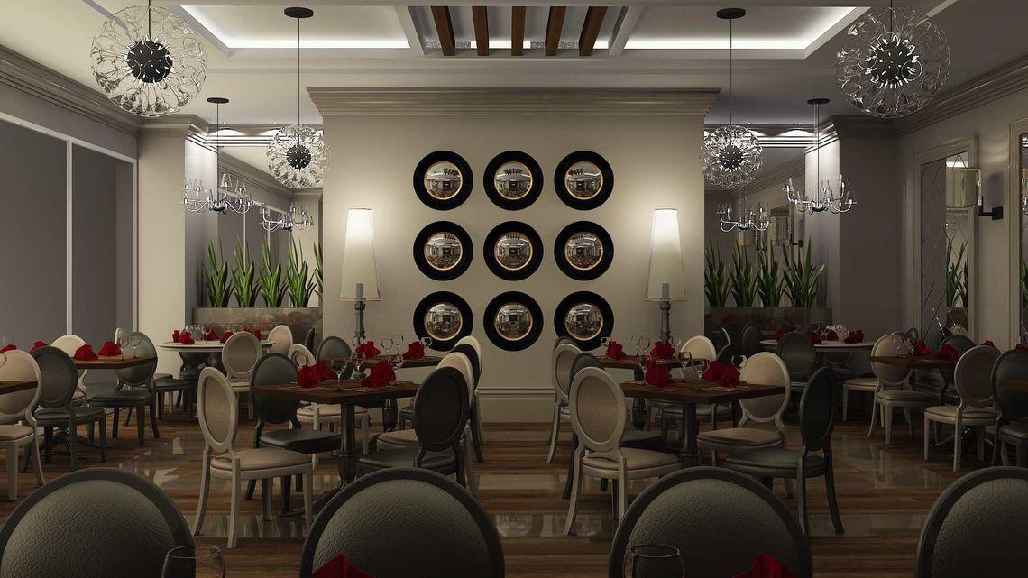 Innenansicht des Restaurants im Side Sunport Hotel & Spa mit Tischdekorationen und Kronleuchtern.
