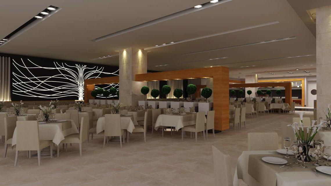 Innenbereich des Restaurants im Side Sunport Hotel & Spa mit gedeckten Tischen und illuminierter Wand