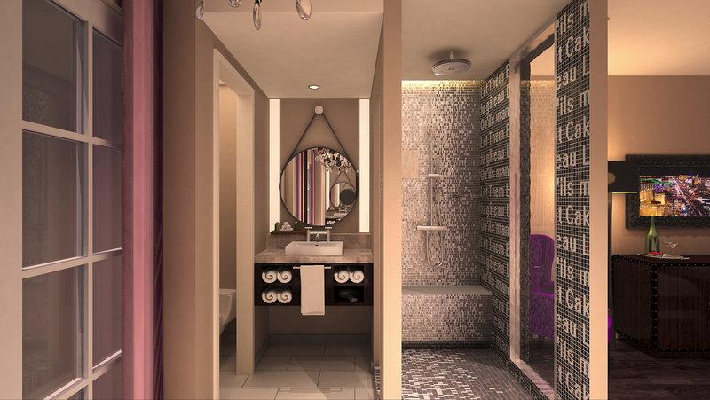Innenansicht eines Badezimmers im Cromwell Las Vegas Hotel & Casino mit Spiegel, Waschbecken und gefliester Wand.