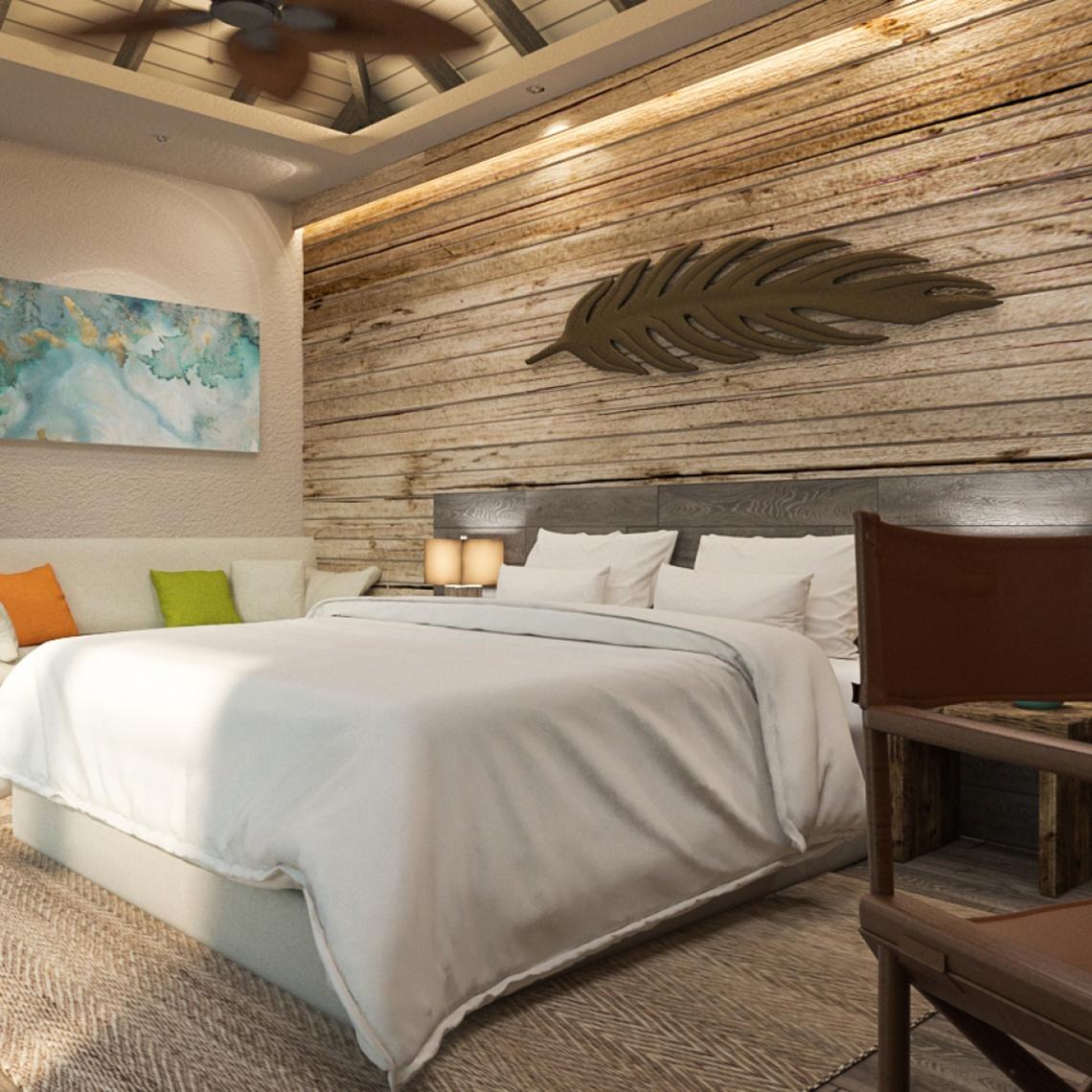 Schlafzimmer mit Holzwand im You & Me Maldives Hotel, Bett mit weißen Laken, Kissen und Decken.