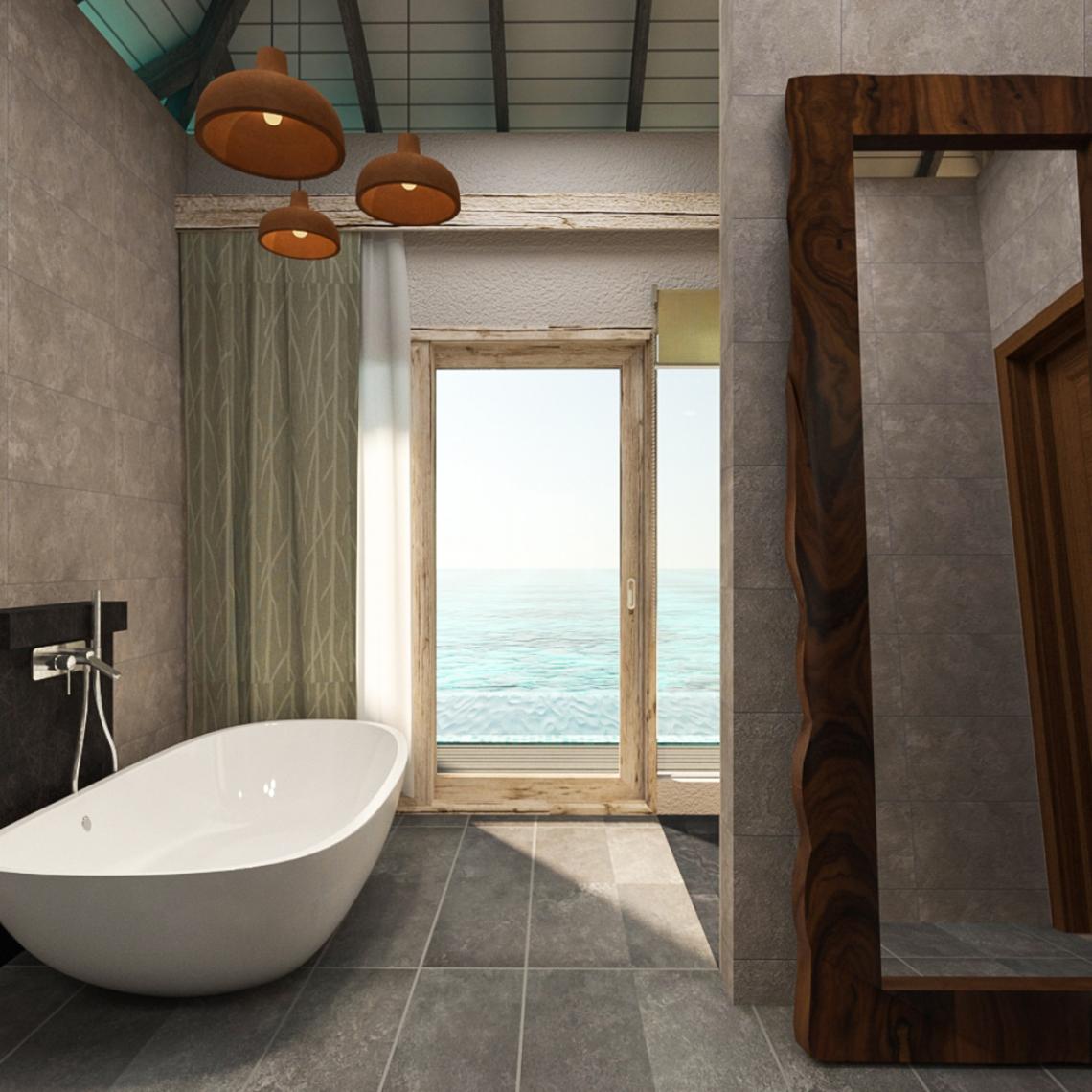 Badezimmer mit Meerblick im You & Me Maldives Hotel mit Badewanne und Glastür.