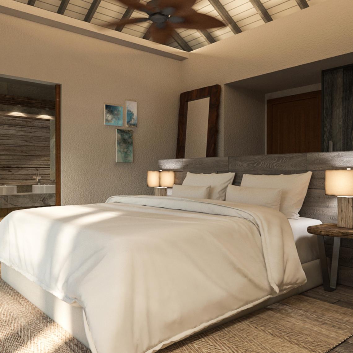 Schlafzimmer im You & Me Maldives Hotel mit weißem Bett und Nachttischen.