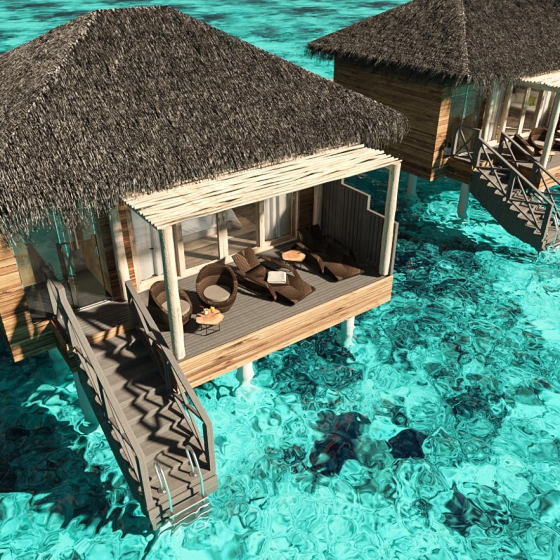 Überwasser Bungalow im You & Me Maldives mit Holzbrücke und Sonnenliegen im Wasser