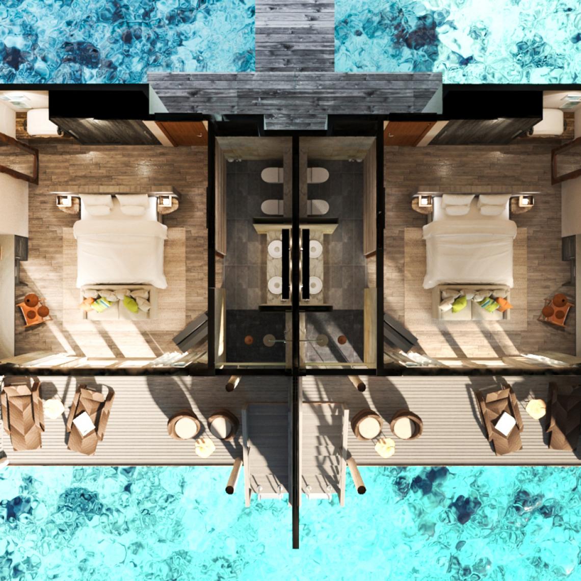 Luftaufnahme des You & Me Maldives Hotels mit Wasserbetten und Aussicht auf das Meer.