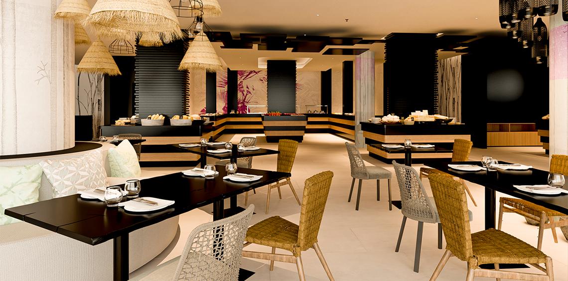 Innenansicht des Restaurants im Faro, a Lopesan Collection Hotel mit modernen Möbeln und Tischdecken.