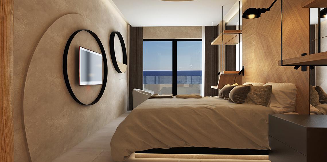 Innenansicht eines Schlafzimmers im Faro, a Lopesan Collection Hotel mit Blick auf das Meer.