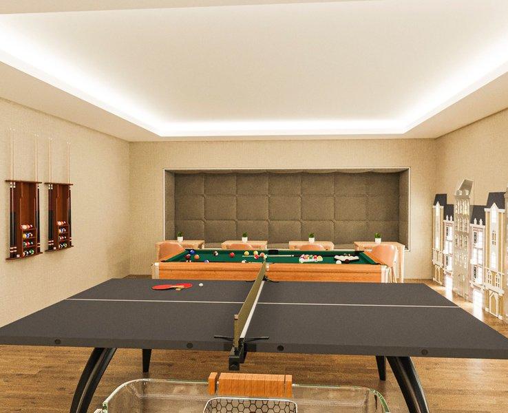 Spielzimmer im Arcanus Hotels Trendline Side mit Tischtennistisch und Billardtisch.