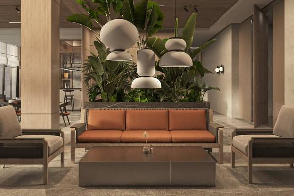Lobby des Jaz Elite Amara Hotels mit Sofa, Sesseln und Pflanzen