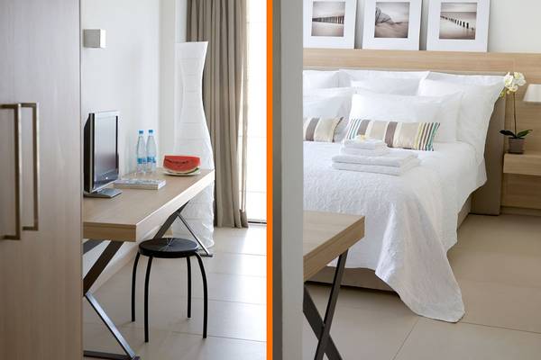 Foto des Schlafzimmers und des Arbeitsbereichs im Sentido Sandy Beach Hotel & Spa