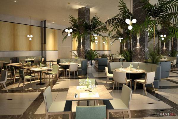 Innenansicht des NissiBlu Beach Resort Restaurants mit modernen Möbeln und tropischen Pflanzen.