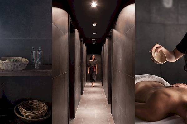 Spa-Bereich des Myconian Avaton Resorts mit verschiedenen Einrichtungen und einer Massageszene.