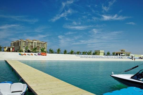 Foto von Marjan Island Resort & Spa mit Strand, Wasser und Booten